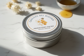 Chalises Bee Blessed honey soap bar in a circular silver tin can closed top with label